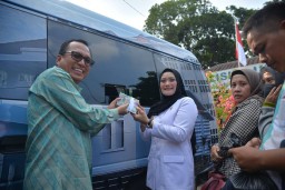 BI Madiun Layani Penukaran Uang Baru dri Mobil Keliling