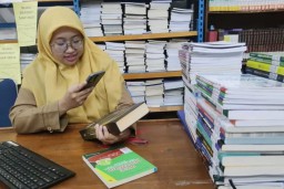 Jatim Gunakan AI Untuk Sistem Pengolahan Bahan Perpustakaan