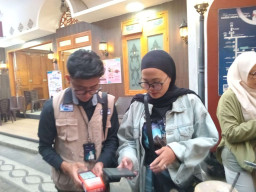 QRIS Tap Dongkrak Perputaran Transaksi di Kayutangan